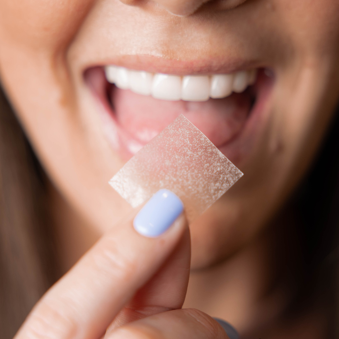 Viva needle-free peptide strip dissolving on the tongue